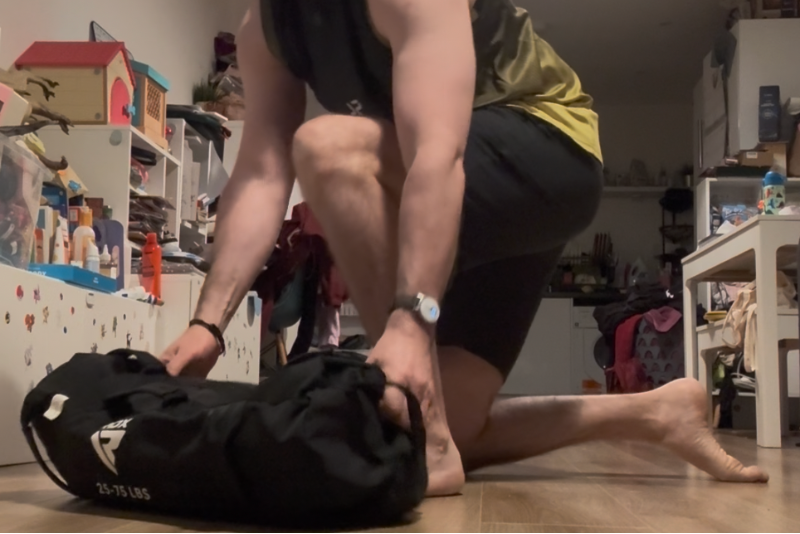 RARP-ID Founder Training with RDX Sandbag at home within a small space.